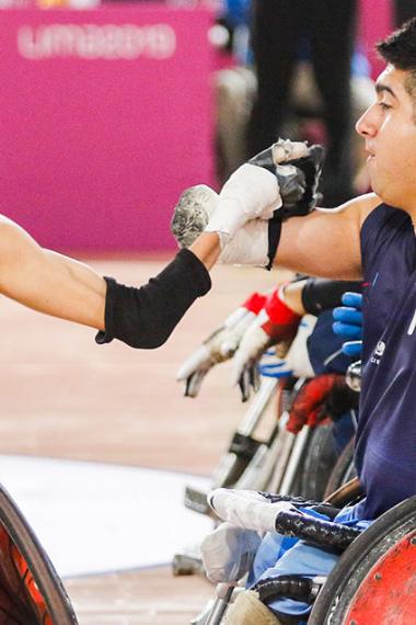 Lautaro Fernandez and Juan Herrera from Argentina play wheelchair rugby at the Lima 2019 Parapan American Games, at Villa El Salvador Sports Center