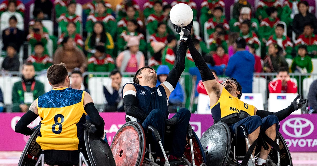 Wheelchair rugby teams from Brazil and Colombia fight for the ball to win the Lima 2019 bronze medal.