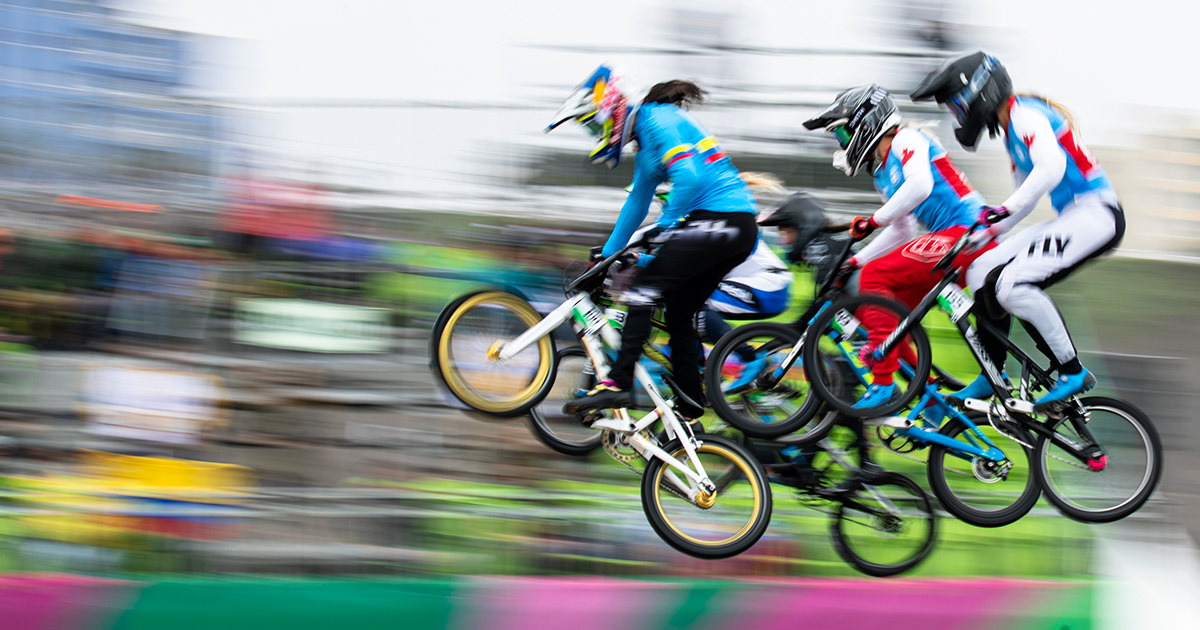 Female cyclists participate in the BMX final at Lima 2019.