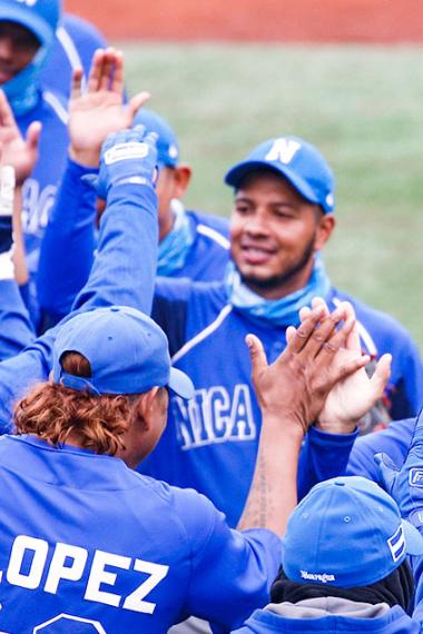 Nicaraguan baseball team celebrates its victory against Colombia at the Villa María del Triunfo Sports Center during the Lima 2019 Games