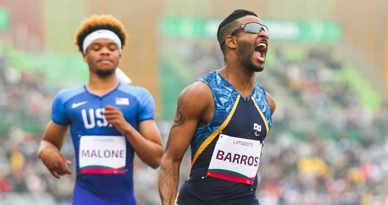 Brazilian Para athlete Fabrício Júnior Barros celebrates his victory in the Lima 2019 men’s 100 m T12 competition at the National Sports Village - VIDENA