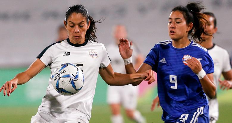 Costa Rica’s Carol Sanchez and Paraguay’s Fabiola Sandoval fight for the ball in the Lima 2019 women's football bronze medal match at San Marcos Stadium