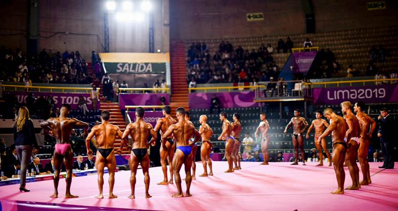 International athletes posing during the last Lima 2019 bodybuilding event held at the Chorrillos Military School	