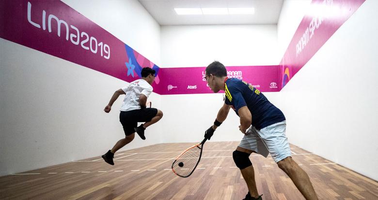 Racquetball player Coby Iwaasa from Canada faces off Sebastián Franco from Colombia during the men’s round of 16 at the Callao Regional Sports Village