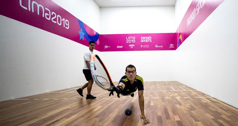 Racquetball player Coby Iwaasa from Canada goes up against Sebastián Franco from Colombia during the men’s round of 16 at the Callao Regional Sports Village