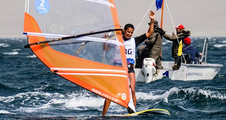 Celia Tejerina of Argentina celebrates her silver medal in the Lima 2019 women’s windsurf event at Paracas Bay.