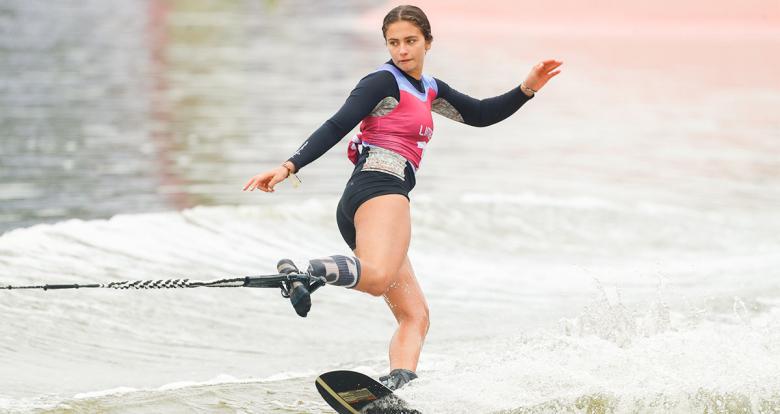 Rini Paige from Canada in mid-air during the water ski competition held at Laguna Bujama.