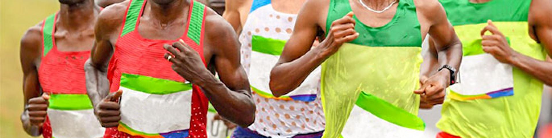 Athletes running together during a marathon competition. 