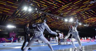 Shauna Biddulph and Kelly Fitzsimmons compete at fencing event for Modern Pentathlon