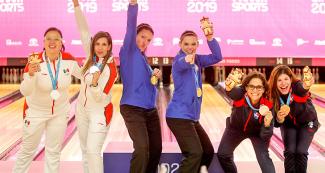Women’s bowling winners celebrating win