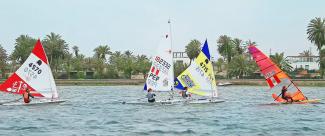 Athletes trying to pass through their opponents during the sailing competition