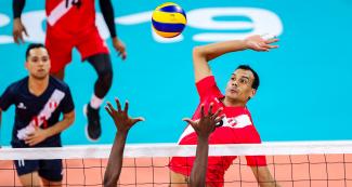 Peruvian volleyball player Benny Bernaola focused on the competition against Cuba, held at the Callao Regional Sports Village at the Lima 2019 Pan American Games.