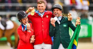 American Lynn Symansky (silver), American Boyd Martin (gold), and Brazilian Carlos Parro (bronze) after equestrian individual final at the Lima 2019 Games