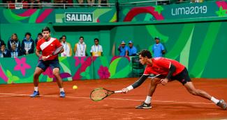 The Peruvian tennis team consisting of Sergio Galdos and Juan Pablo Varillas during the Lima 2019 men’s doubles event at the Lawn Tennis Club