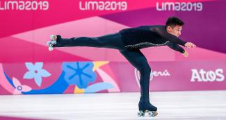 Chilean athlete Jose Luis Diaz performs an artistic roller skating exhibition