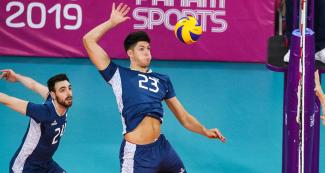 Argentinian volleyball player Joaquín Gallego returns the ball to Puerto Rico at the Callao Regional Sports Village during the Lima 2019 Games.