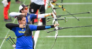 Vinicius Dalmeida Marcuso from Brazil aiming with his recurved bow at the villa María del Triunfo Sports Center, Lima 2019 Games