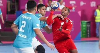 Jorge Nazario from Puerto Rico competes against Mexico in the handball match held at the National Sports Village – VIDENA at the Lima 2019 Games
