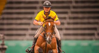 Diego Javier Vivero riding his horse during equestrian individual jumping training session at the Army Equestrian School