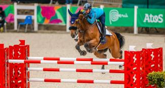Uruguayan Marcelo Chirico riding his horse during equestrian individual jumping training session at the Army Equestrian School