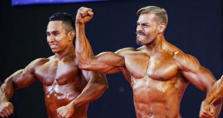 The Salvadorian William Yuri Rodríguez González and the Guatemalan Jonathan Martinez Catalan participating in the Lima 2019 classic bodybuilding event held at the Chorrillos Military School	