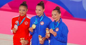 Canada’s Katherine Uchida won silver; while Americans Evita Griskenas and Camila Feeley were awarded the gold and bronze medals, respectively in rhythmic gymnastics at the Villa El Salvador Sports Center