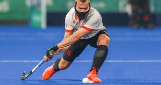 Canadian Gordon Johnston hits the ball during the game against Chile at Villa María del Triunfo Sports Center, Lima 2019 Games