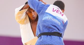 Peruvian judoka Juan Postigos goes up against Venezuelan Ricardo Valderrama in the Lima 2019 men’s -66 kg competition at the National Sports Village – VIDENA