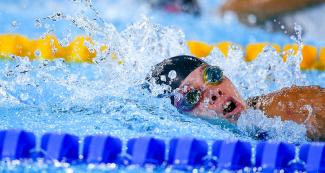 Blanca Mitchel from Antigua and Barbuda competing in the Lima 2019 women’s 100m freestyle at the National Sports Village – VIDENA