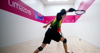 Carlos Keller from Bolivia gets ready to hit the ball during the Lima 2019 racquetball match against Canada at the Callao Regional Sports Village