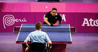  Henry Cuenca (Cuba) hits the ball back to Fernando Eberhardt (Argentina) during a Para table tennis match at the Lima 2019 Parapan American Games