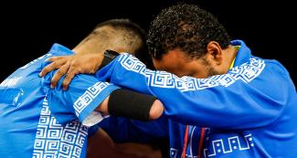 Melvin Muñoz, from El Salvador, hugs Jerry Vasquez, from USA, during the Lima 2019 Parapan American Games