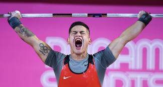 Peruvian Oscar Terrones competes in the men’s 73 kg weightlifting event held at the Chorrillos Military School at the Lima 2019 Games.	