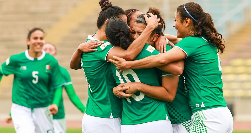 Mexican women's football players celebrate goals during win against Jamaica at Lima 2019