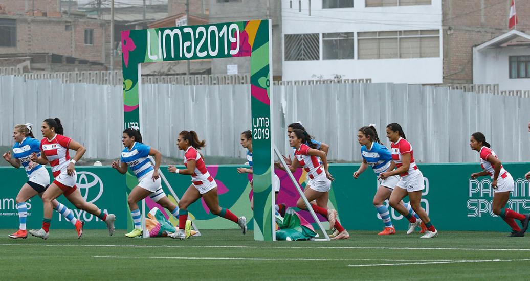The Argentinian and Mexican teams run on to the field on the last day of the women’s rugby-7 competition