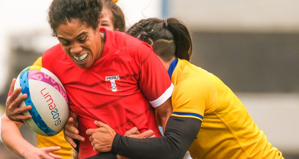 Peru’s Paula Pacheco facing Brazil on the first day of Rugby-sevens competition