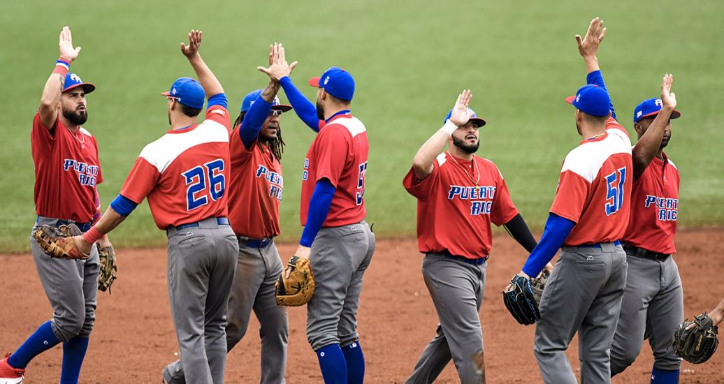 Puerto Rican baseball team celebrating victory over Nicaragua at the Lima 2019 Games