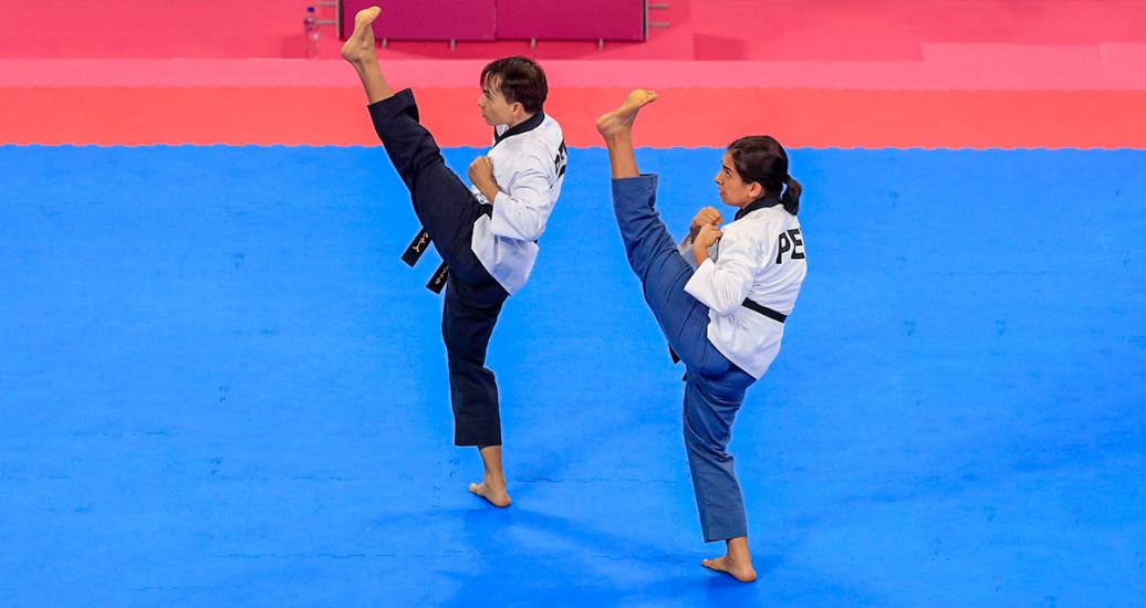 Adriana Vera and Renzo Saux participate in the Poomsae mixed pairs event