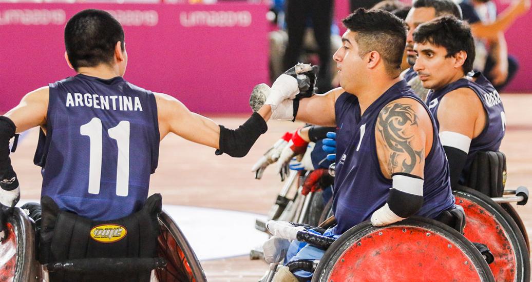 Lautaro Fernandez and Juan Herrera from Argentina play wheelchair rugby at the Lima 2019 Parapan American Games, at Villa El Salvador Sports Center