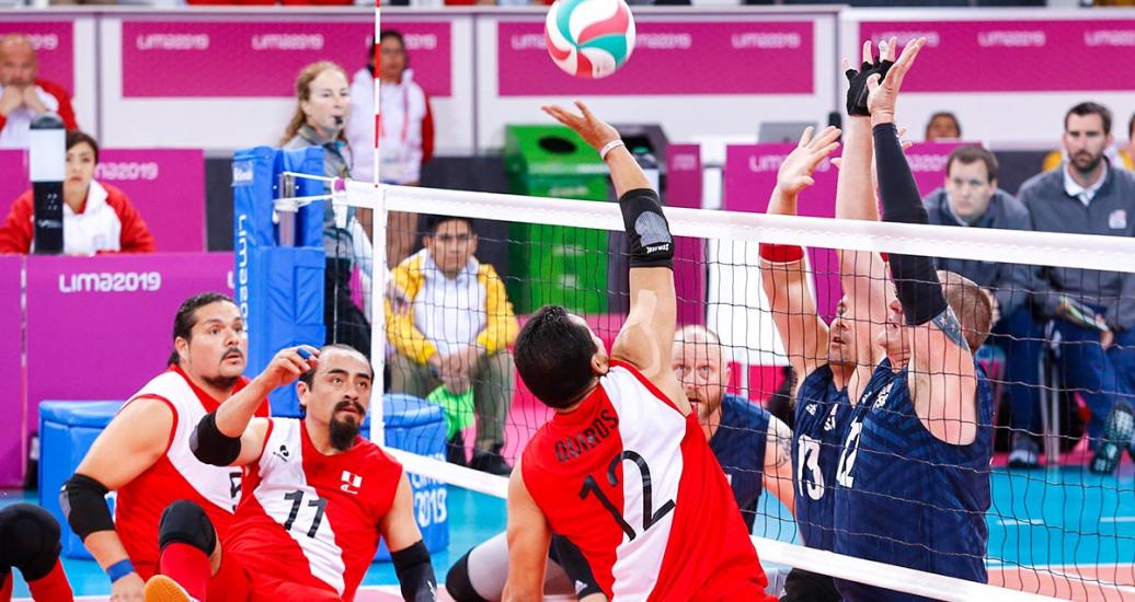 Peruvian Bruno Quiros faces off the American sitting volleyball team at the Lima 2019 Parapan American Games, at Callao Regional Sports Village