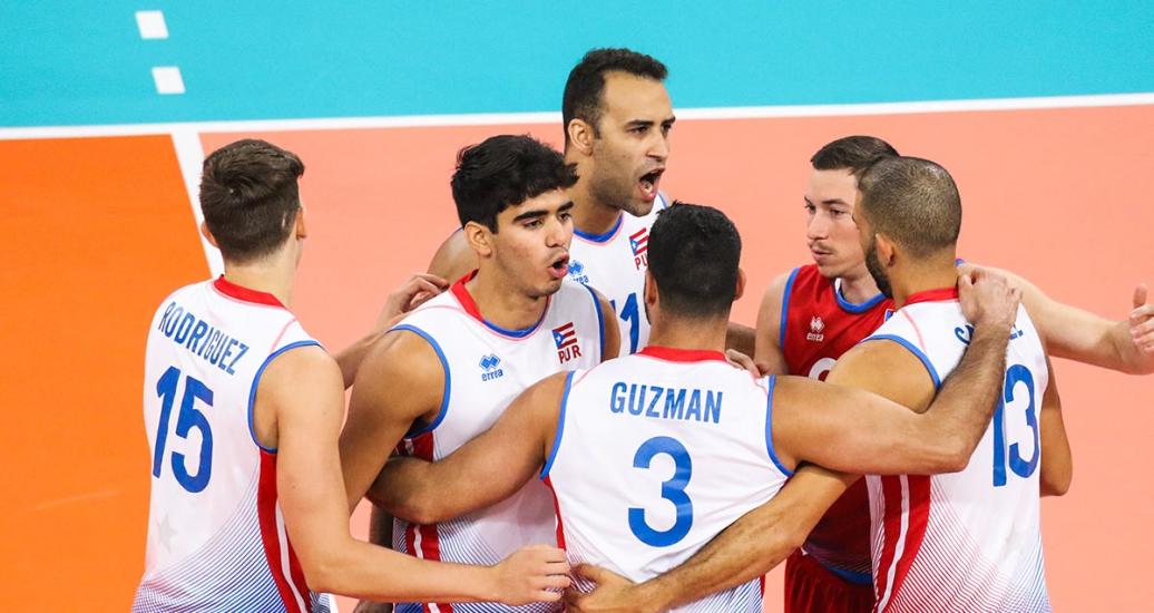 Puerto Rican volleyball team celebrates a point against Argentina at the Callao Regional Sports Village during the Lima 2019 Games.