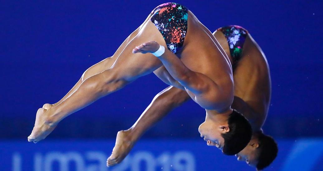 Ivan García Navarro and Kevin Berlín Reyes from Mexico show their best performance in the diving final event held at the National Sports Village – VIDENA during the Lima 2019 Games. 
