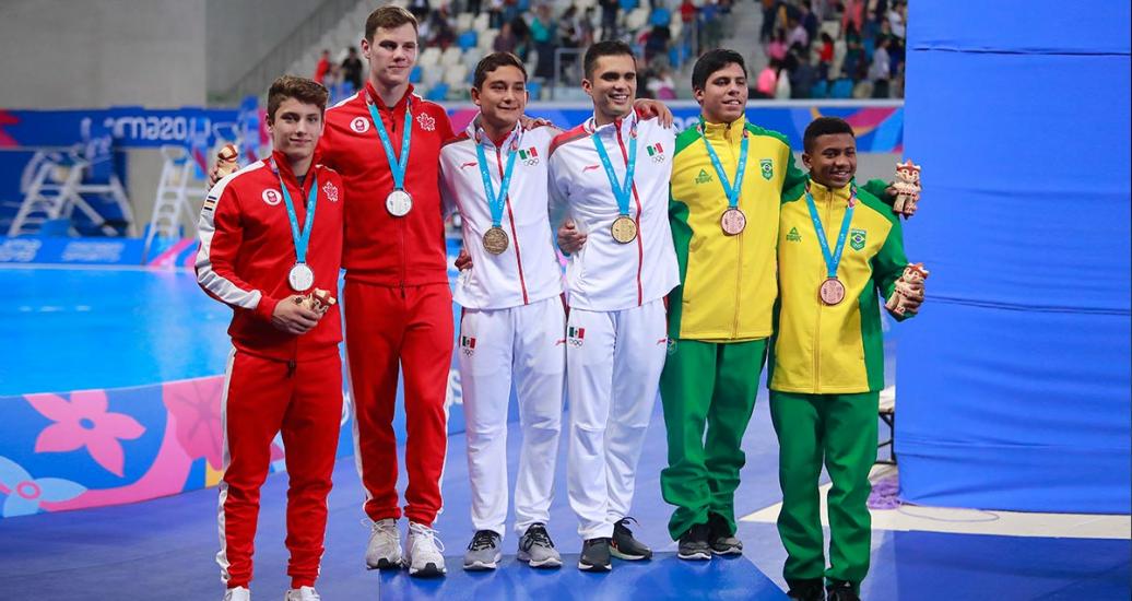 Vincent Riendeau and Nathan Zsombor - Murray from Canada (silver), Ivan García and Kevin Reyes from Mexico (gold), and Isaac Nascimiento and Kawan Figueredo from Brazil (bronze) in 10m diving event at the Lima 2019 Games 