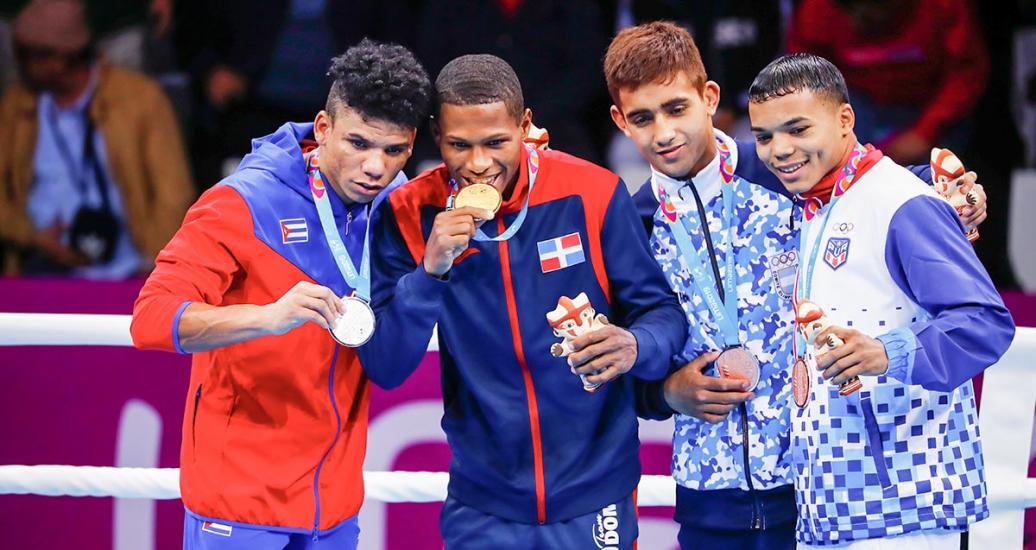 Dominican Rodrigo Marte , Cuban Yosbany Veitía, Argentinian Ramón Quiroga and Puerto Rican Yankiel Rivera show their gold, silver, and bronze medals, respectively, after the men’s boxing competition of the Lima 2019 Pan American Games at the Callao Regional Sports Village.