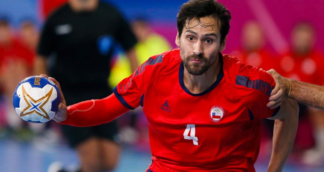 Chile’s Erwin Feuchtmann and Argentina’s Pablo Vainstein during the handball final held at the VIDENA at the Lima2019 Pan American Games