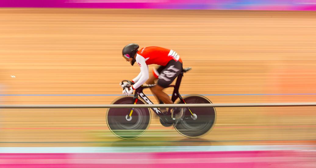 Philip Nijsane from Trinidad y Tobago moves at full speed in the Lima 2019 track cycling competition held at the National Sports Village - VIDENA