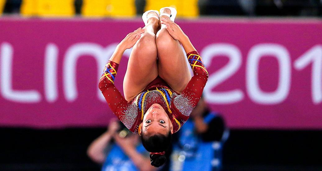 tish Hernández from Colombia performs a stunt in the trampoline competition at the Lima 2019 Games held at the Villa El Salvador Sports Center