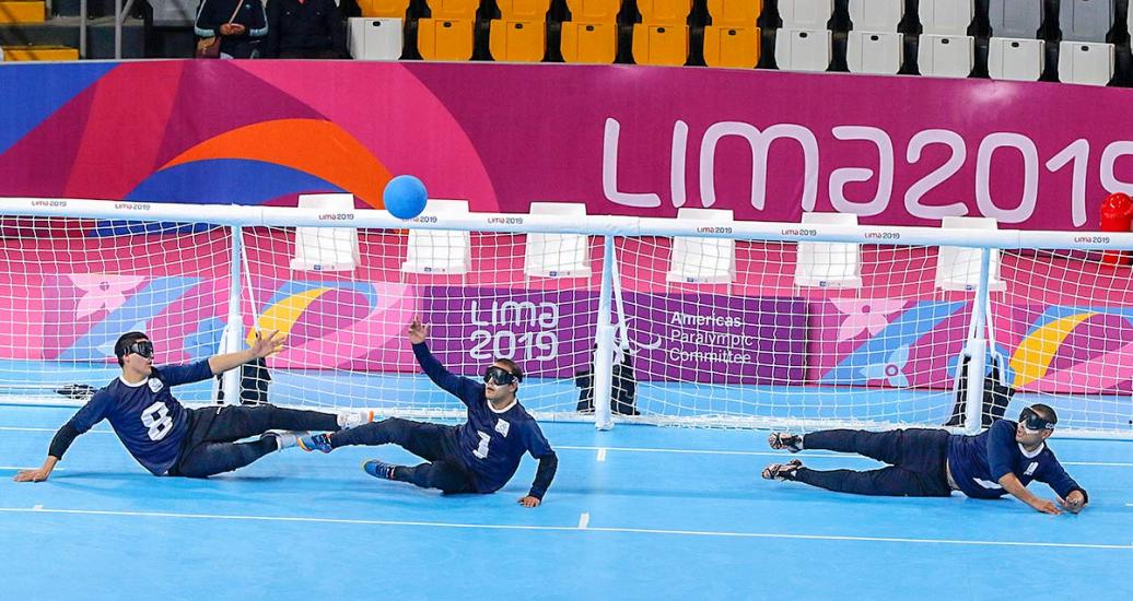 The Argentinian goalball team tries to catch the ball in the match against Brazil at the Callao Regional Sports Village at Lima 2019.