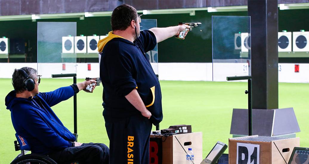 Michael Tagliapietra from USA and Geraldo Rosenthal from Brazil during the mixed 25 m sport pistol SH1 final stage at Las Palmas Air Base, at Lima 2019.
