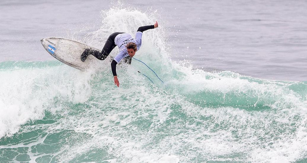 Argentinian surfer Ornella Pellizzari competing in the fifth round of women’s open surfing repechage at the Lima 2019 Games in Punta Rocas. 